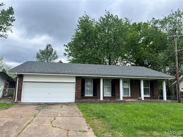 2018 Elkins Dr, Saint Louis, MO 63136 - ranch-style home featuring driveway, a garage, brick siding, and covered porch