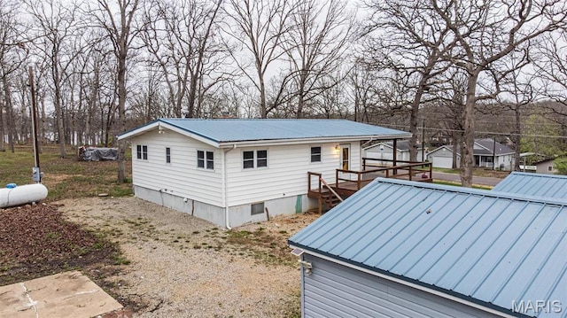 777 Squaw Rd, Cuba, MO 65453 - view of property exterior featuring metal roof