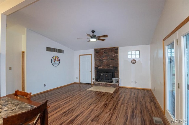 777 Squaw Rd, Cuba, MO 65453 - unfurnished living room with vaulted ceiling, dark wood-type flooring, ceiling fan, and baseboards