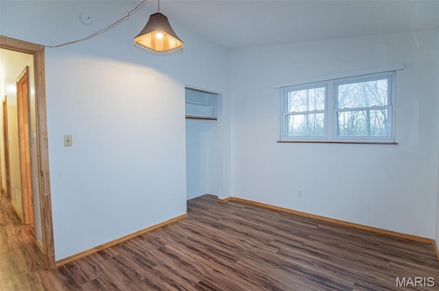 777 Squaw Rd, Cuba, MO 65453 - unfurnished room with dark wood-style floors, baseboards, and a smoke detector
