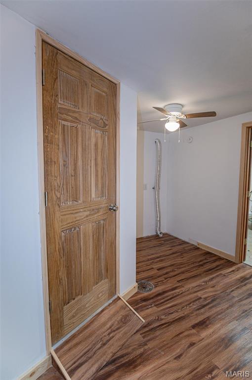 777 Squaw Rd, Cuba, MO 65453 - empty room featuring wood finished floors, ceiling fan, and baseboards