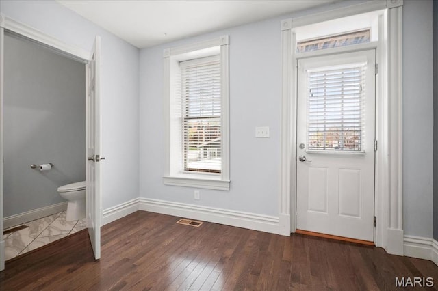 3974 Utah St, Saint Louis, MO 63116 - entryway featuring baseboards and wood finished floors