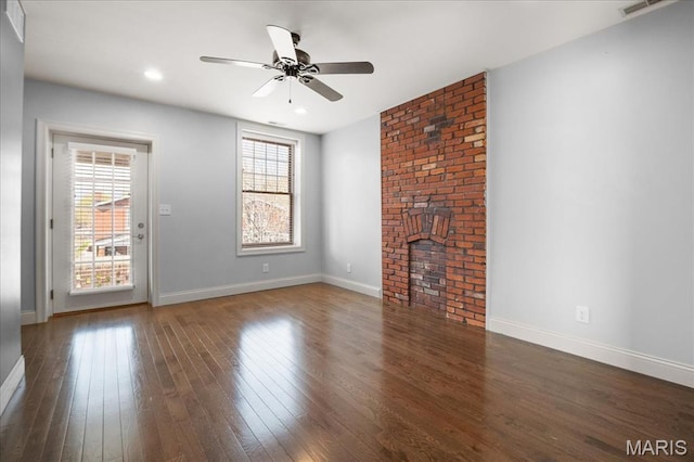3974 Utah St, Saint Louis, MO 63116 - unfurnished living room featuring plenty of natural light, hardwood / wood-style flooring, a ceiling fan, and baseboards