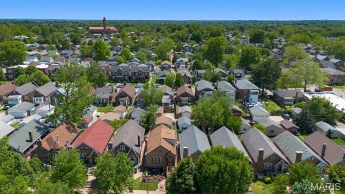 aerial overview of property's location featuring nearby suburban area