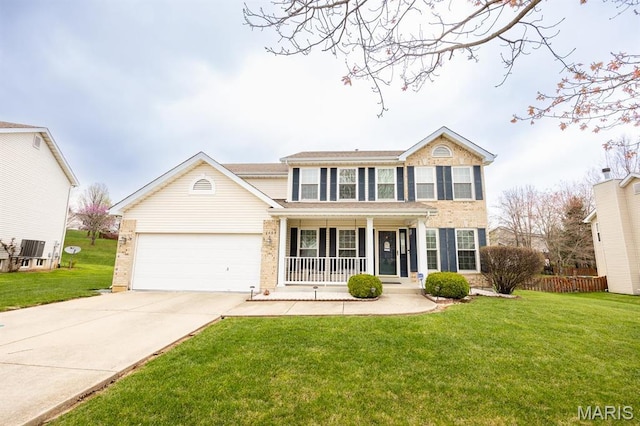 view of front facade featuring a porch, an attached garage, concrete driveway, and brick siding