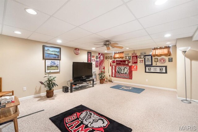living area with carpet floors, recessed lighting, a paneled ceiling, baseboards, and a ceiling fan