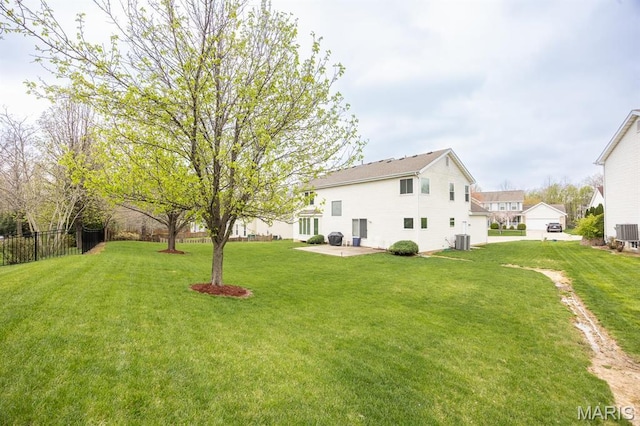 view of yard featuring a patio area and central AC unit