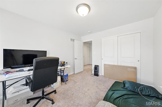 office space featuring carpet and baseboards