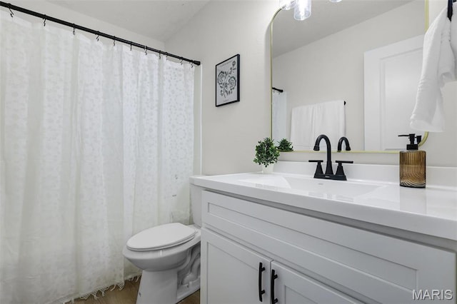 full bath featuring vanity, toilet, and wood finished floors