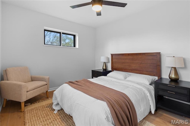 4410 Robbins Mill Rd, Florissant, MO 63034 - bedroom with wood finished floors and a ceiling fan