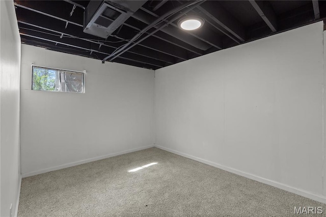 4410 Robbins Mill Rd, Florissant, MO 63034 - below grade area featuring carpet flooring and baseboards