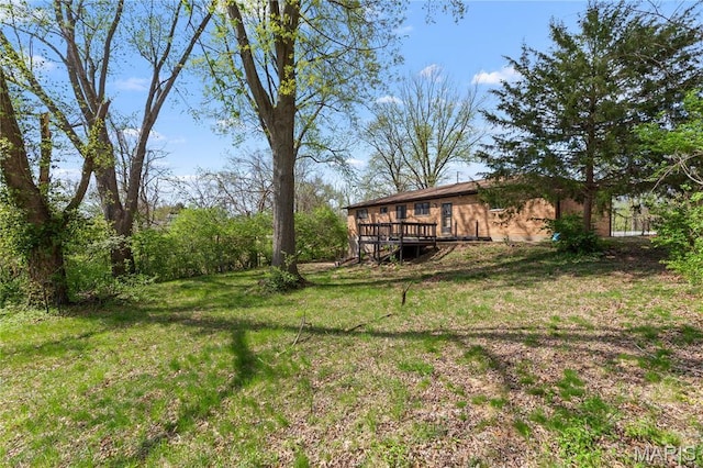 4410 Robbins Mill Rd, Florissant, MO 63034 - view of green lawn with a deck