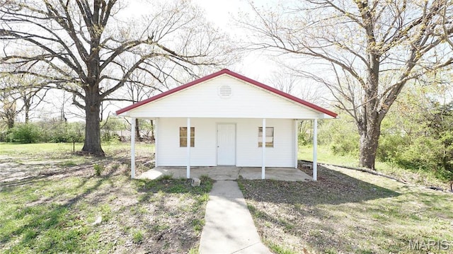 view of outbuilding featuring a porch