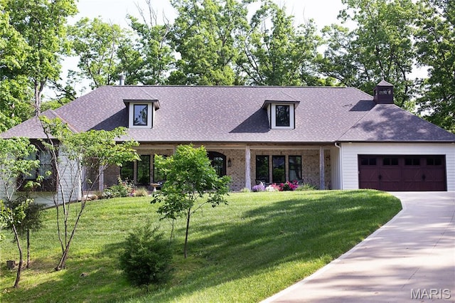 3 Inland Ct, Wright City, MO 63390 - view of front of house featuring a garage, brick siding, a shingled roof, a front yard, and driveway