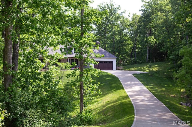 3 Inland Ct, Wright City, MO 63390 - view of front of property with a front lawn, a garage, and driveway