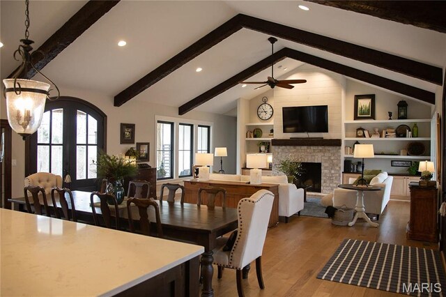 3 Inland Ct, Wright City, MO 63390 - dining room with dark wood finished floors, recessed lighting, a fireplace, ceiling fan, and built in features