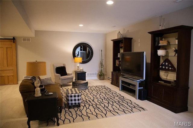3 Inland Ct, Wright City, MO 63390 - carpeted living area with a barn door and recessed lighting