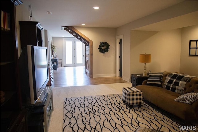 3 Inland Ct, Wright City, MO 63390 - living area with recessed lighting, wood finished floors, baseboards, carpet flooring, and french doors