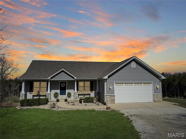 641 Ponderosa Trl, Beaufort, MO 63013 - view of front of house featuring driveway, covered porch, stone siding, an attached garage, and a yard
