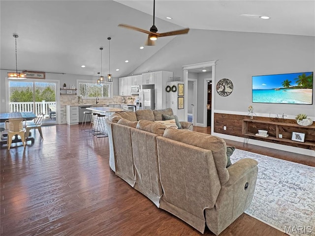 641 Ponderosa Trl, Beaufort, MO 63013 - living room featuring dark wood-style flooring, a ceiling fan, recessed lighting, and high vaulted ceiling