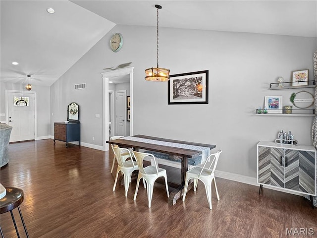641 Ponderosa Trl, Beaufort, MO 63013 - dining area featuring wood finished floors, high vaulted ceiling, and baseboards