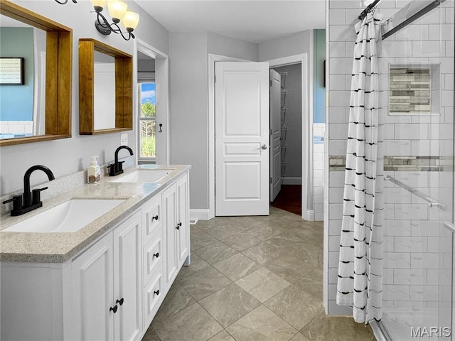 641 Ponderosa Trl, Beaufort, MO 63013 - full bathroom featuring a shower stall, baseboards, and double vanity