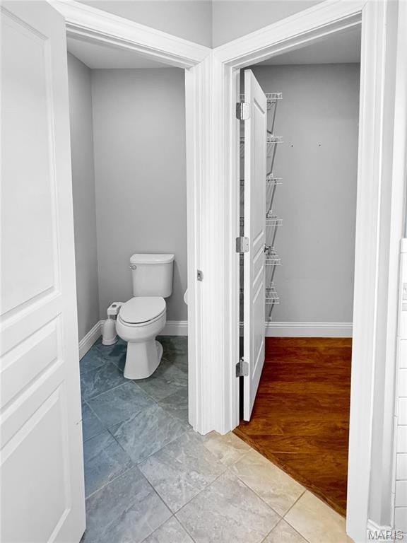 641 Ponderosa Trl, Beaufort, MO 63013 - bathroom featuring toilet and baseboards