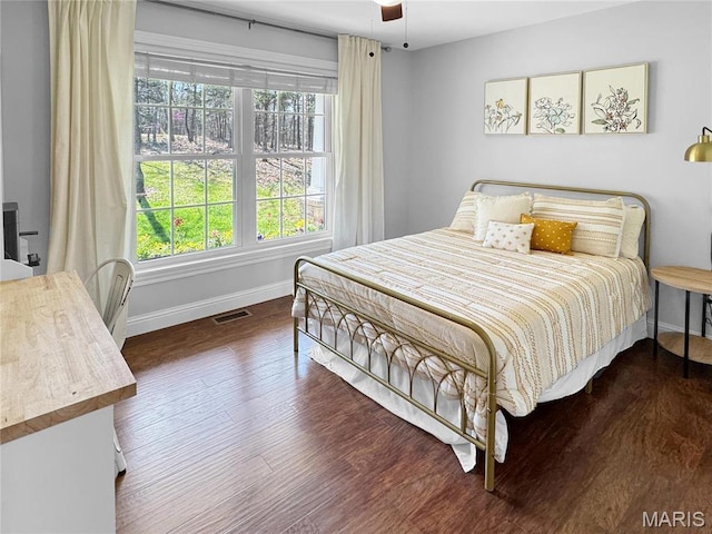 641 Ponderosa Trl, Beaufort, MO 63013 - bedroom featuring baseboards, wood finished floors, and a ceiling fan