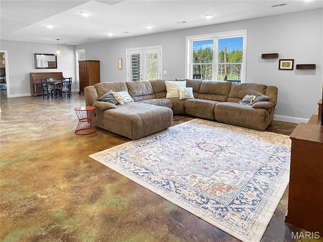 641 Ponderosa Trl, Beaufort, MO 63013 - living room with finished concrete flooring, baseboards, and recessed lighting