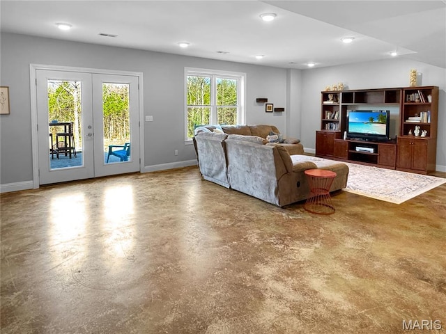 641 Ponderosa Trl, Beaufort, MO 63013 - living room featuring concrete flooring, french doors, baseboards, and recessed lighting