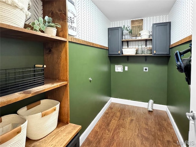 641 Ponderosa Trl, Beaufort, MO 63013 - clothes washing area with electric dryer hookup, baseboards, dark wood finished floors, and wallpapered walls