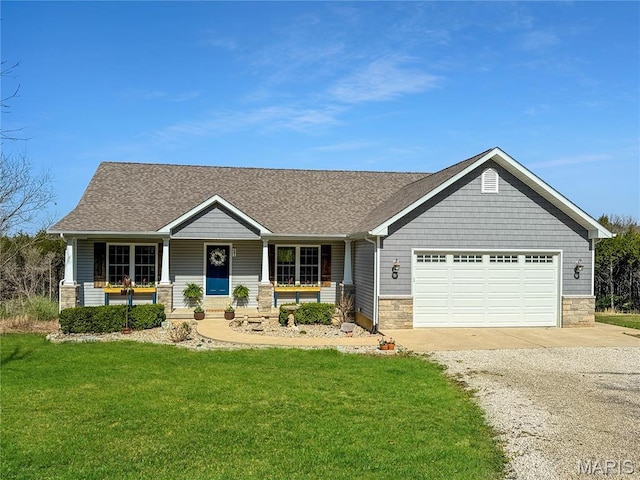 641 Ponderosa Trl, Beaufort, MO 63013 - view of front of property featuring gravel driveway, a porch, stone siding, a front yard, and a garage