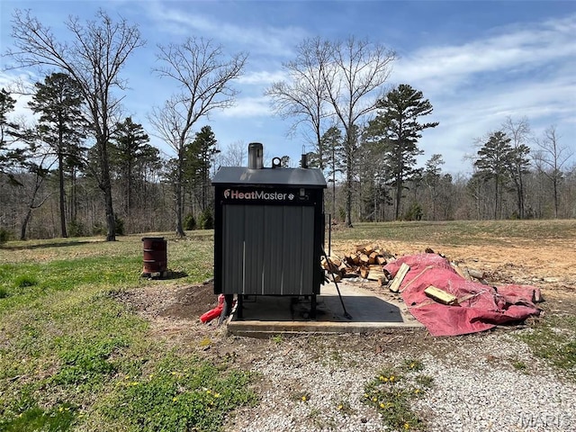 10303 Woodberry Rd, Potosi, MO 63664 - exterior view of a wood stove