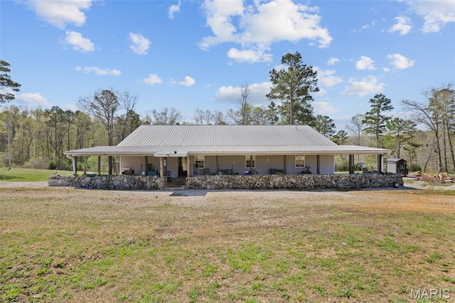 10303 Woodberry Rd, Potosi, MO 63664 - view of front facade featuring covered porch, a front lawn, and metal roof