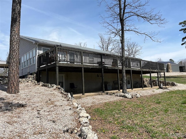 10303 Woodberry Rd, Potosi, MO 63664 - rear view of property with a wooden deck