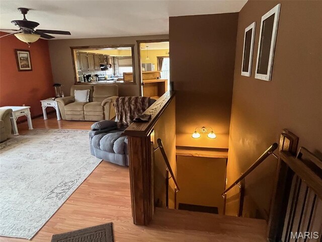 10303 Woodberry Rd, Potosi, MO 63664 - living area featuring a ceiling fan and light wood finished floors