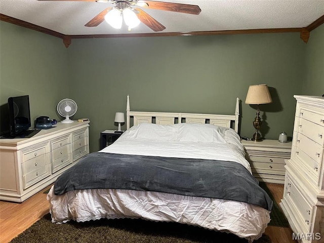 10303 Woodberry Rd, Potosi, MO 63664 - bedroom featuring crown molding, wood finished floors, and ceiling fan