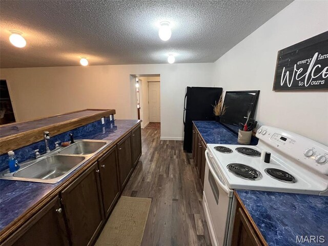 10303 Woodberry Rd, Potosi, MO 63664 - kitchen featuring white range with electric cooktop, a sink, dark wood-type flooring, a textured ceiling, and dark brown cabinets