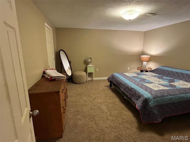 10303 Woodberry Rd, Potosi, MO 63664 - carpeted bedroom featuring a textured ceiling and baseboards