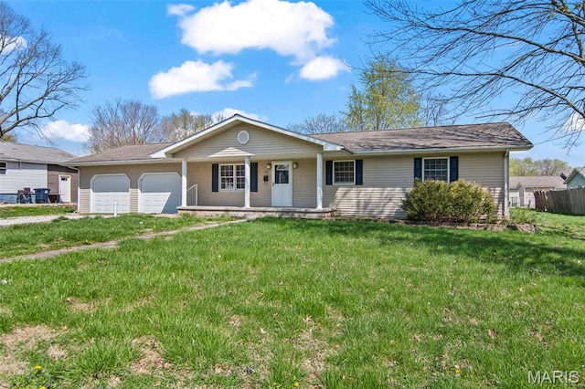 1112 N Illinois Ave, Litchfield, IL 62056 - ranch-style home with covered porch and an attached garage