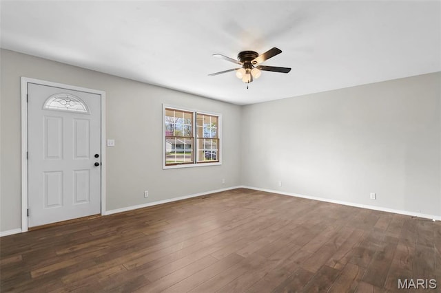 1112 N Illinois Ave, Litchfield, IL 62056 - foyer featuring ceiling fan, dark wood-type flooring, and baseboards