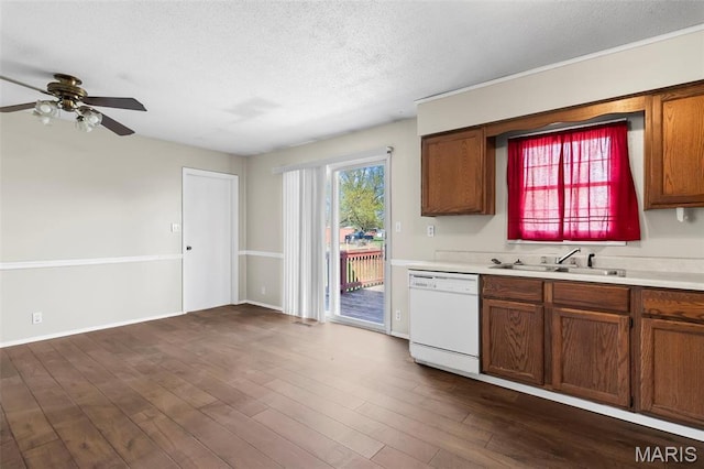 1112 N Illinois Ave, Litchfield, IL 62056 - kitchen featuring a sink, white dishwasher, light countertops, a textured ceiling, and ceiling fan