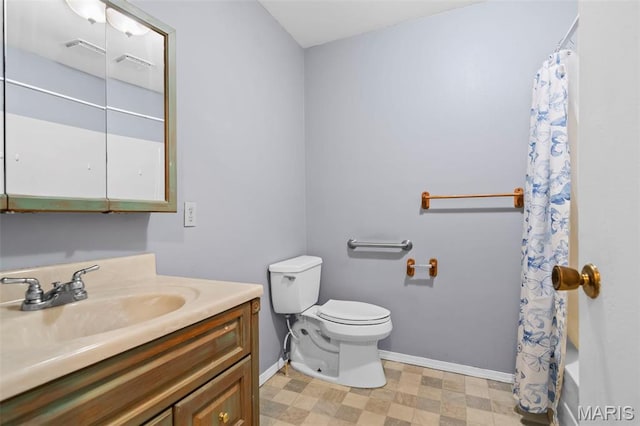 1112 N Illinois Ave, Litchfield, IL 62056 - full bath with tile patterned floors, toilet, baseboards, and vanity