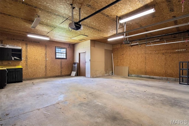 1112 N Illinois Ave, Litchfield, IL 62056 - garage featuring a garage door opener