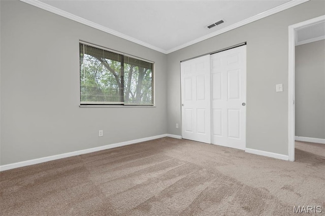 11148 Whispering Oaks Dr, Saint Louis, MO 63136 - unfurnished bedroom with ornamental molding, carpet floors, baseboards, and a closet