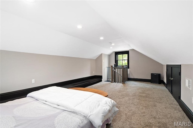 bedroom featuring light colored carpet, vaulted ceiling, baseboards, and recessed lighting