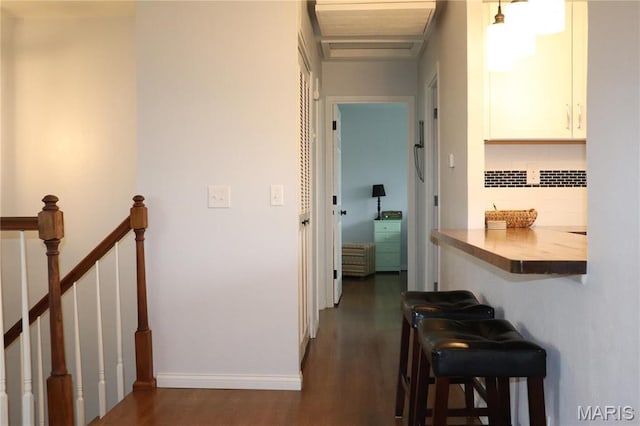hall featuring dark wood finished floors