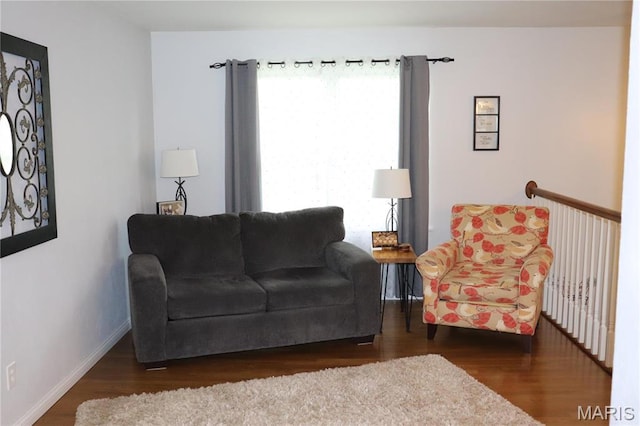 sitting room featuring wood finished floors and baseboards