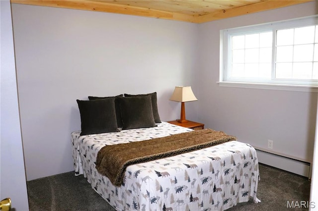 bedroom with baseboard heating, carpet floors, and wood ceiling