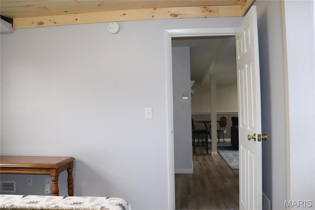bedroom with wood finished floors